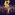 On a dark navy blue background, two long lines of glamorous performers make a V formation.