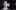 A black and white photo of Albert Quesada smiling
