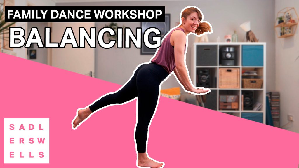 Family dance workshop - Balancing Cherie Coleman standing in a balance while leading a dance workshop