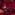 On an apocalyptic city street bathed in red light, a group of seven people head towards us, one on a motorbike, one with a fist in the air, others prowling forward in fishnets, leathers, baseball boots and bustiers, the scene framed by two columns of flame.