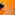 A naked male dancer with a fake black bull against an orange background