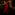 A female flamenco dancer poses in a red dress