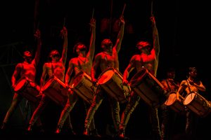 Malevo A large group of male Malambo dancers drumming on stage
