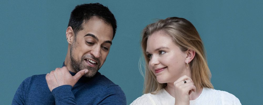 Arts Work Podcast © Camilla Greenwell A man and woman stood side by side, smiling and posing cheerfully