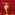 A dancer from the back, standing on tiptoe as if dancing ballet, wearing tutu-trousers. The background is a solid red colour, and below the dancer is an array of large red and yellow giant pom poms.