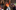Candoco Over and Over © Hugo Glendinning A blurry image of five people in bright clothes dancing against a rocky background. There is a feeling of joy.