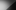 A black and white still from Inside the Blind Iris of a man walking up a tall staircase